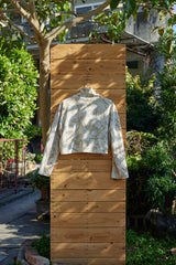 Short length jacquard knit top with high neck