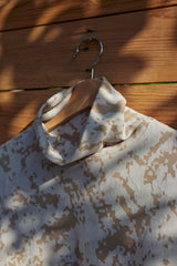 Short length jacquard knit top with high neck
