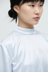 Silbernes drapiertes Wellentop