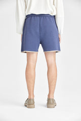 Indigoblaue Shorts mit geschwungenen Taschen