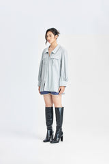 Indigoblaue Shorts mit geschwungenen Taschen